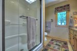 Loft Master Bathroom with a large shower stall and double vanity 